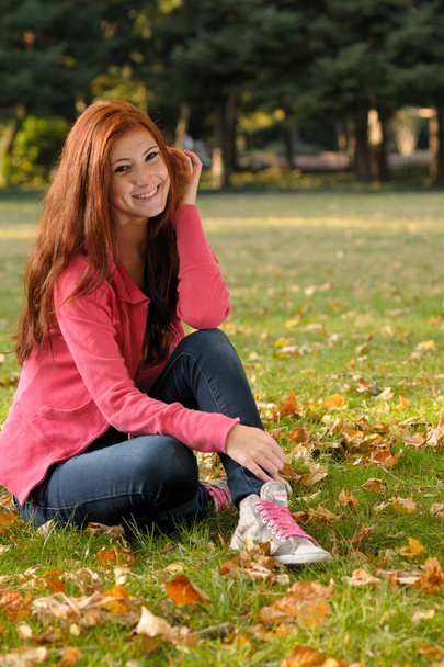 Smiling girl with freckles and red-hair - Фото, изображение