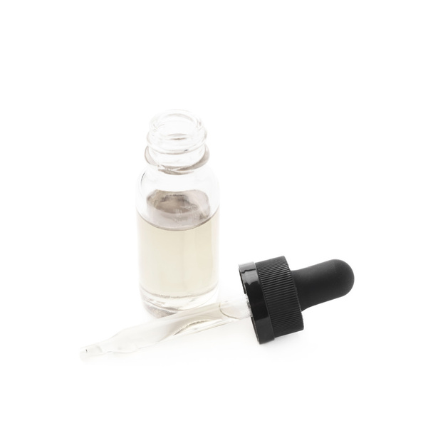 Small bottle with a pipette - Foto, imagen