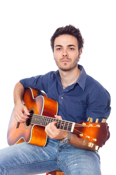 Young Man Playing Guitar - Fotografie, Obrázek