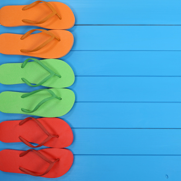 Flip Flops sandals in summer on beach, vacation with copyspace - Foto, Imagem