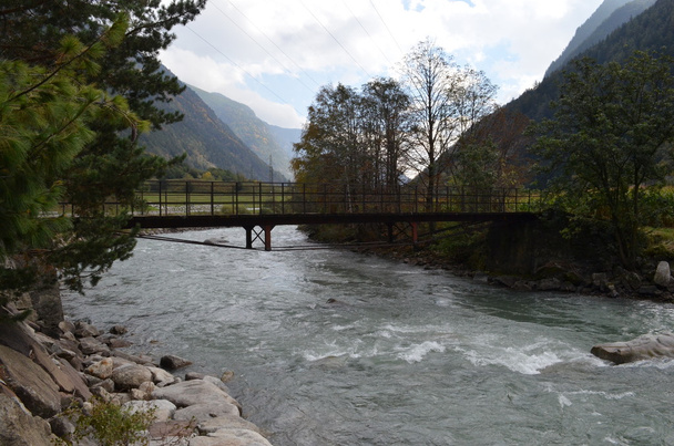 small steel bridge across the river - Photo, Image