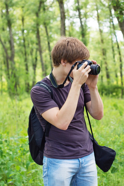 Portrait of a photographer in park - Foto, Bild
