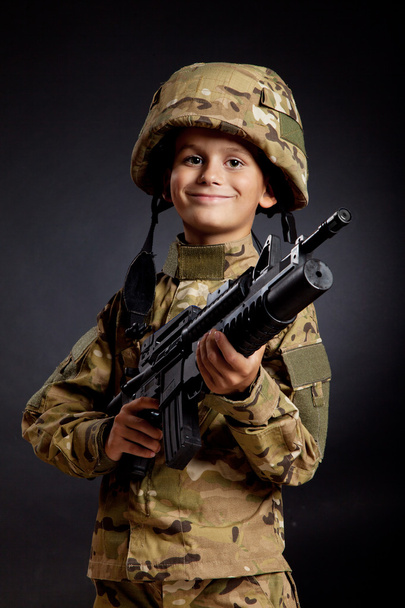 Young soldier with rifle - Zdjęcie, obraz