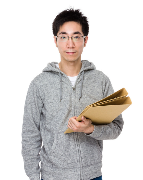 Jovem asiático homem em cinza com capuz
 - Foto, Imagem