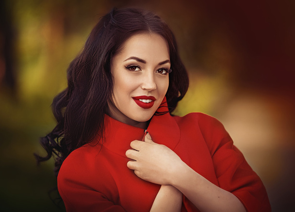 woman in a stylish red jacket - Photo, Image