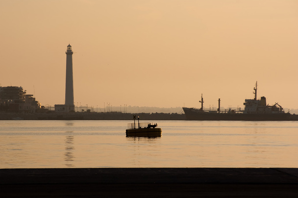 lighthouse at the sunset - Photo, Image