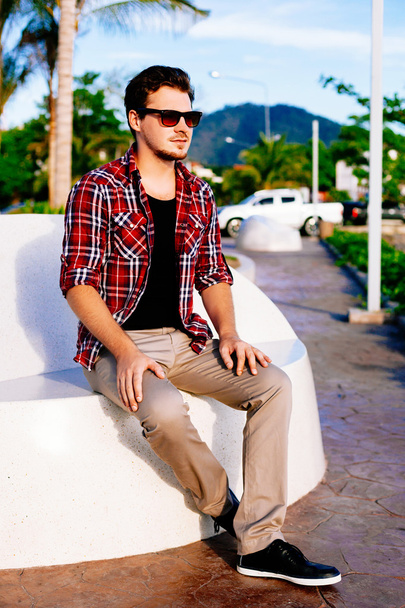 young hipster man at island park - Fotó, kép