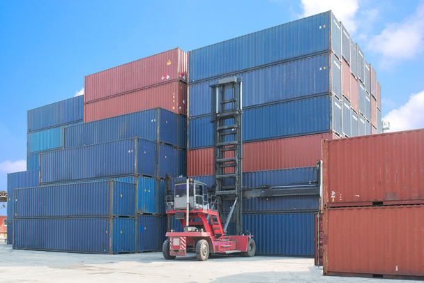 forklift handling container box loading to truck in import expor - Photo, Image