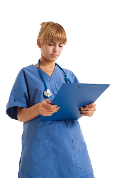 nurse reading a document - Foto, immagini