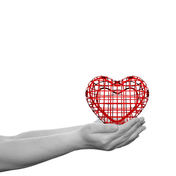Εννοιολογική 3d καρδιά, που πραγματοποιήθηκε στα χέρια του ανθρώπου ή γυναίκα - Φωτογραφία, εικόνα