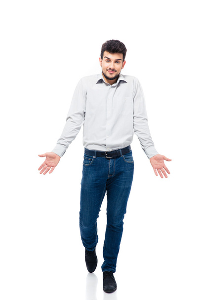 Casual young man shrugging shoulders - Photo, Image