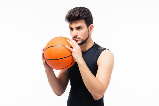Portrait of a basketball player with ball  - Foto, afbeelding