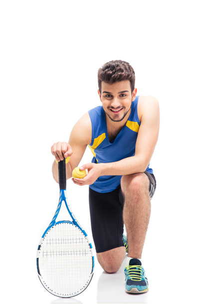 Portrait of a happy male tennis player - Valokuva, kuva