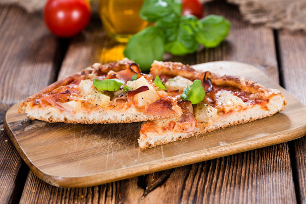Hawaiian Pizza slices with basil - Photo, Image