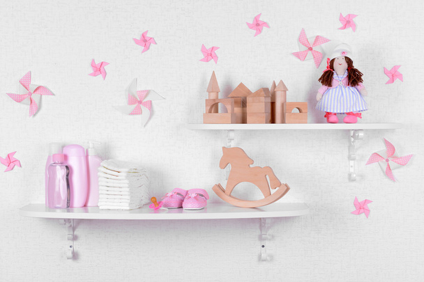 Baby accessories on shelves close-up - Fotó, kép
