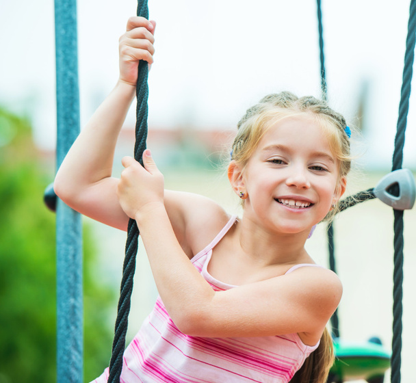 little girl on a playground - Foto, Bild