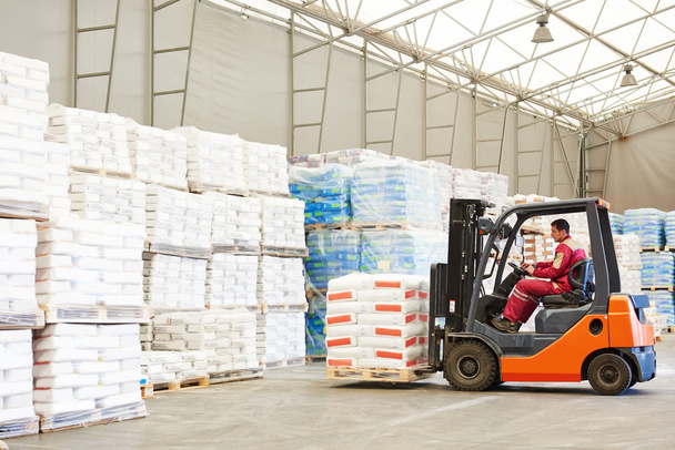 forklift loader working in warehouse  - Foto, immagini