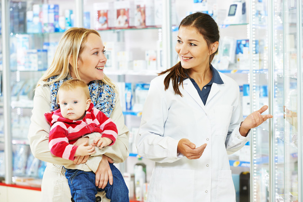 Pharmacy chemist, mother and child in drugstore - Foto, Imagem