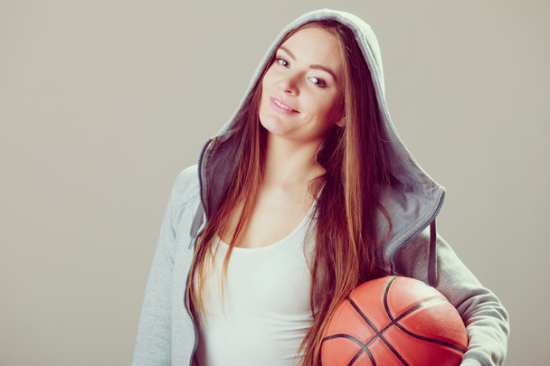 teen girl  holding basketball. - Valokuva, kuva