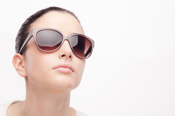 model wearing big sunglasses - Fotó, kép