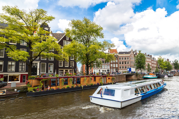 Amsterdam canals and  boats in Holland - Photo, Image