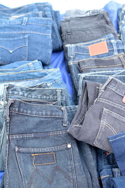 Много винтажных джинсов с фоновой текстурой швов
 - Фото, изображение