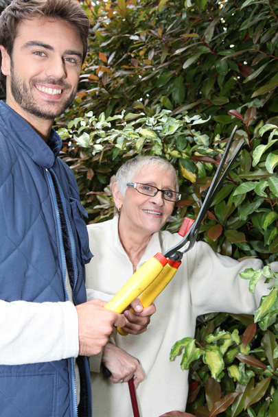 Mother and son gardening - Foto, afbeelding