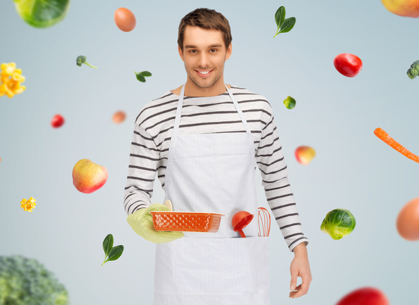 happy man or cook with baking and kitchenware - Фото, зображення