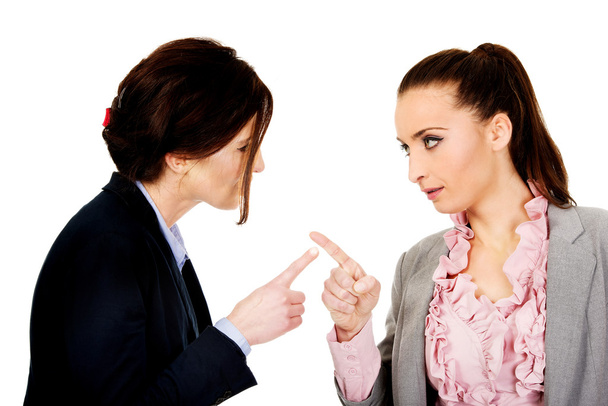 Angry businesswomans pointing on each other. - Foto, afbeelding
