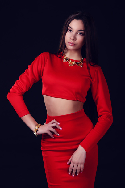 Beautiful woman with dark hair and evening makeup. Jewelry and Beauty. Fashion photo - Foto, immagini
