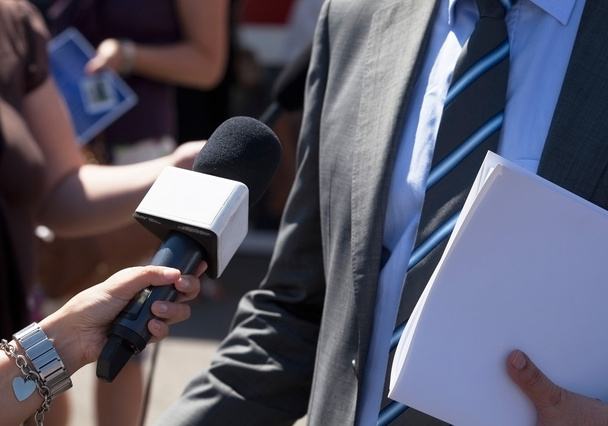 Journalist making media interview with businessman  - Foto, afbeelding