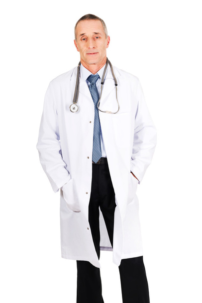 Confident male doctor with his hands in pockets - Photo, Image