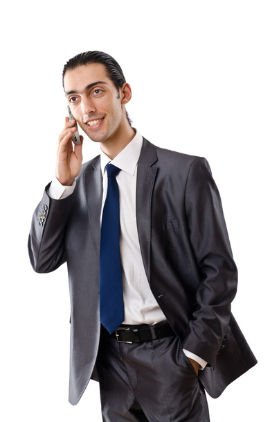 Молодий бізнесмен розмовляє по телефону
 - Фото, зображення