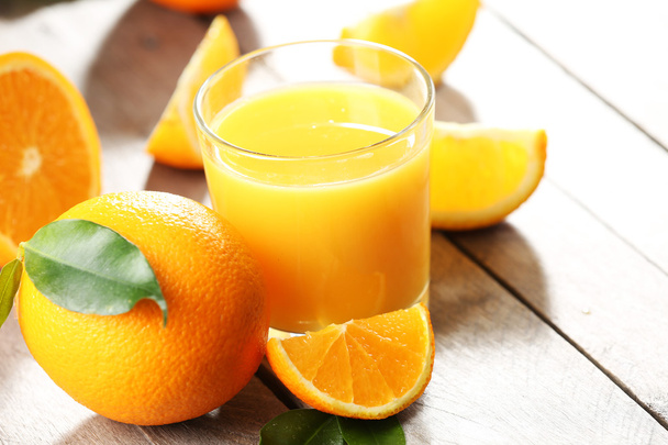 Orange juice on table - Fotó, kép