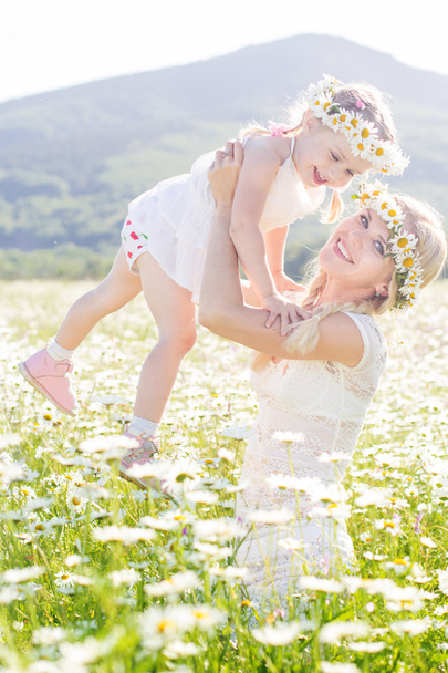 Family mother and child having fun outdoors - Foto, Bild
