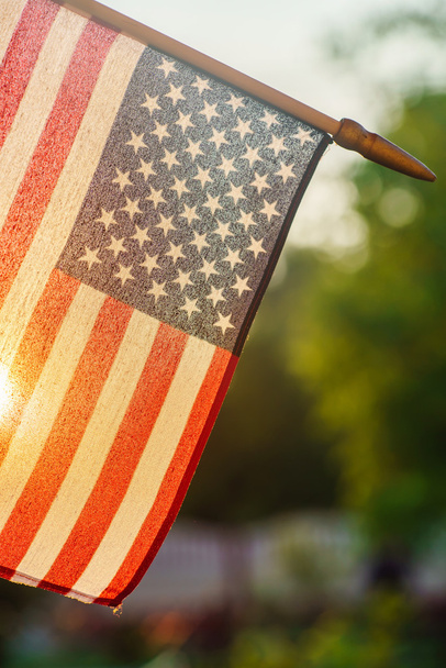 American flag in sunny weather outdoors - Foto, afbeelding