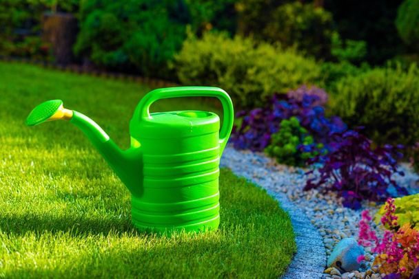 Watering Can in a Garden - Photo, Image