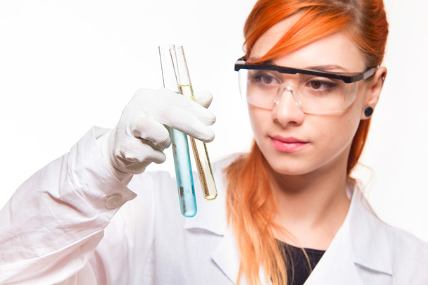Student girl doing chemistry reactions - Photo, Image