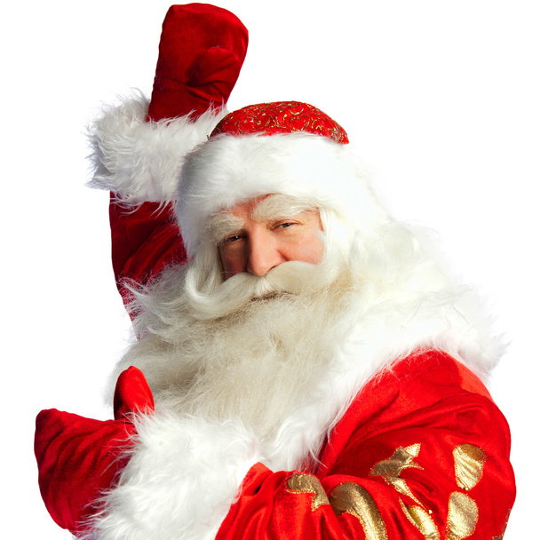 Santa Claus pointing his hand isolated over white. - Foto, imagen