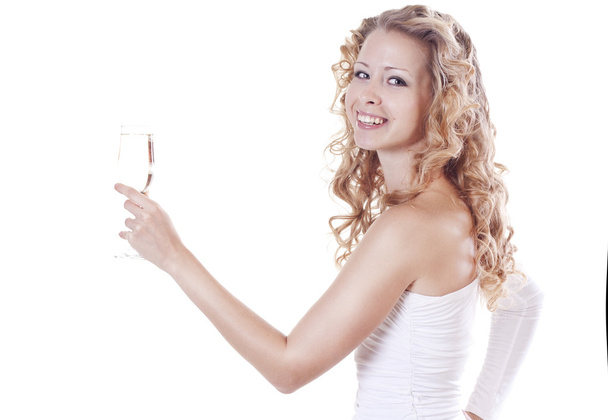 Young woman drinking a champagne - Фото, изображение