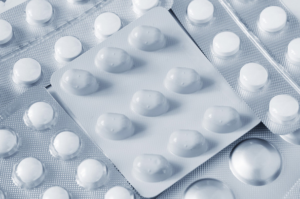pillen zijn in blisterverpakking close-up - Foto, afbeelding