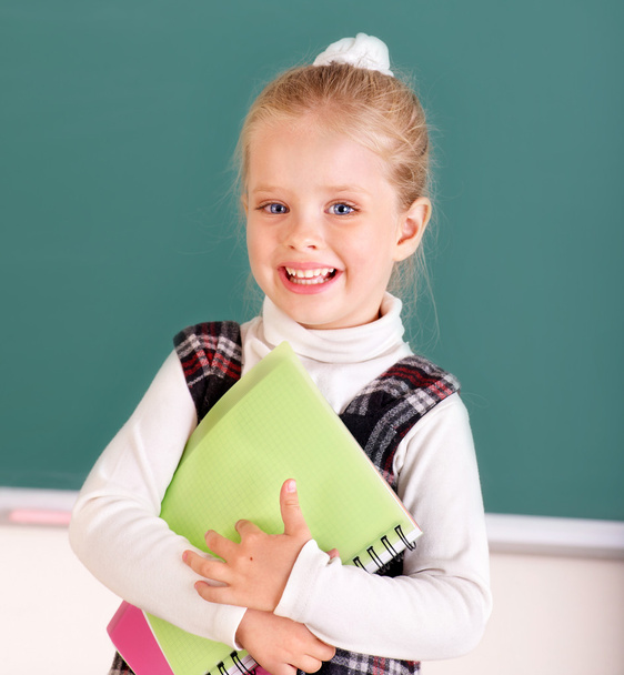 Schoolchild near blackboard. - Foto, Imagem