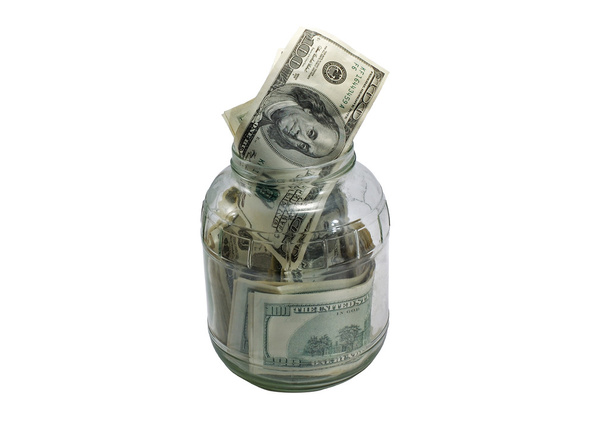 Dollar in einem Glas isoliert auf weißem Hintergrund - Foto, Bild