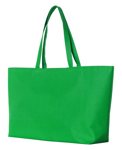 groene stof tas geïsoleerd op wit met uitknippad - Foto, afbeelding