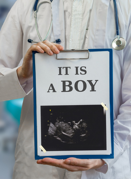 Gynecologist doctor announcing boy to pregnant pacient - Фото, зображення