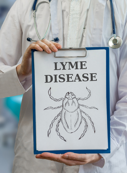 Попередження лікаря про хворобу Лайма, спричинену кліщами
 - Фото, зображення