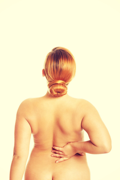 Fat woman with back pain - Zdjęcie, obraz