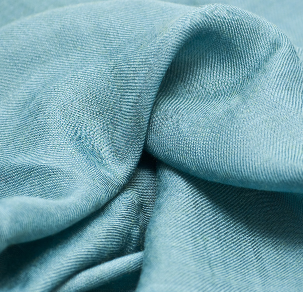 Абстрактный фон синий шелковая ткань с волнами
. - Фото, изображение