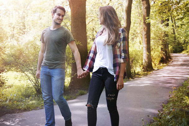 couple in love holding hands and walking - Photo, Image