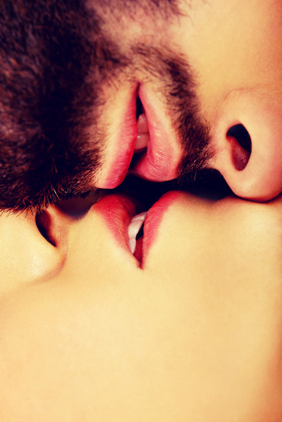 Happy beautiful couple kissing. - Photo, image